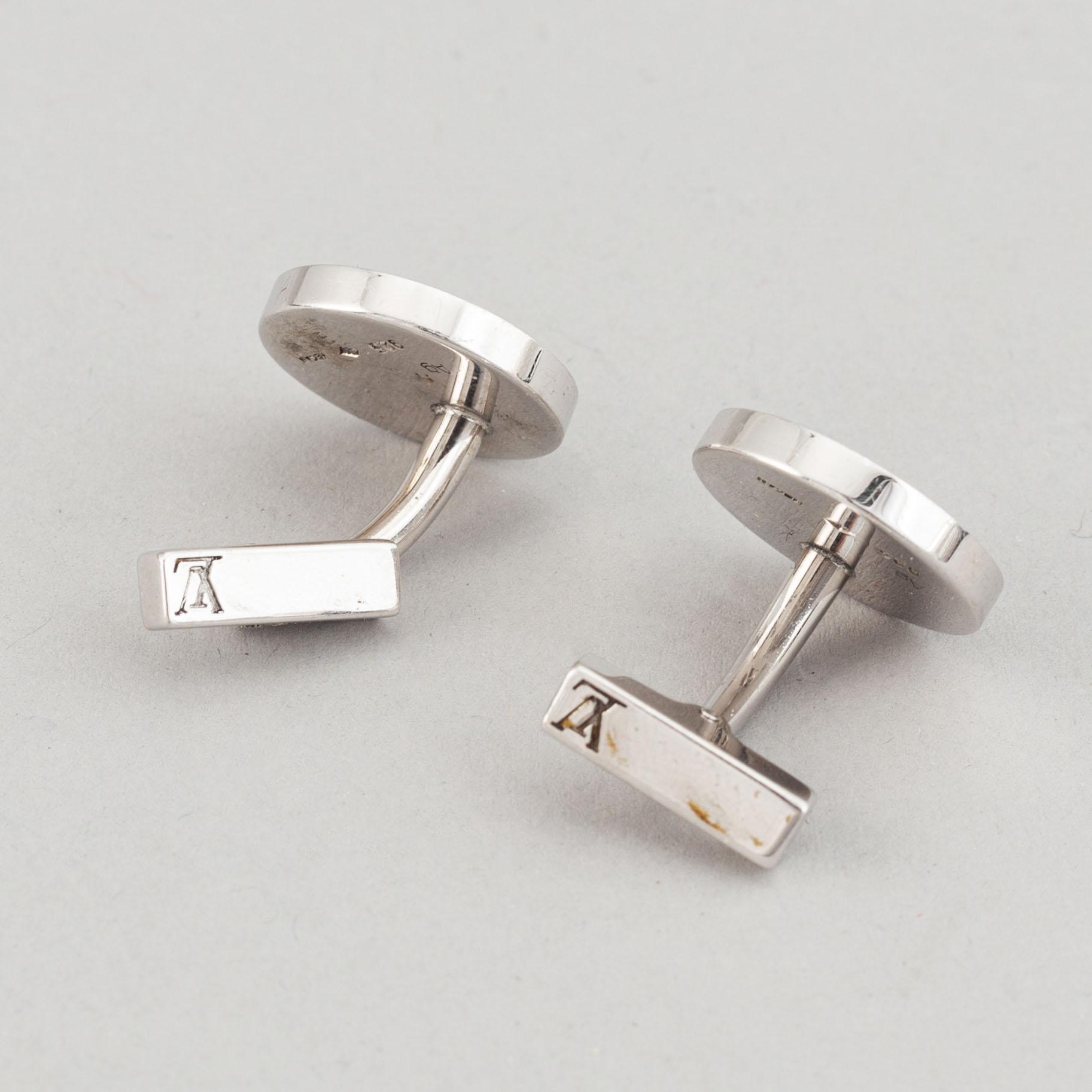 Louis Vuitton and Giorgio Armani, two pairs of cufflinks.