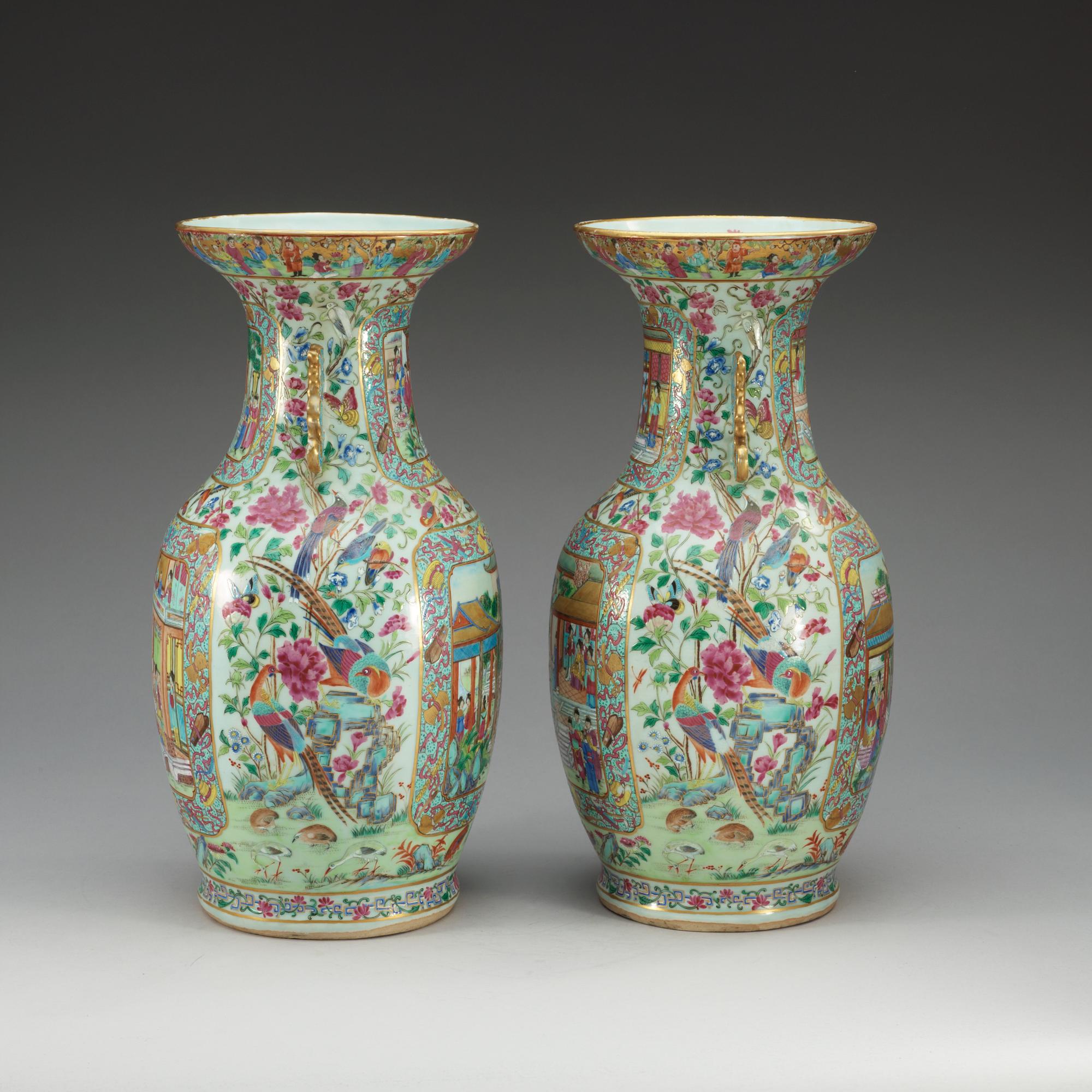 A pair of famille rose Canton vases, Qing dynasty, 19th Century.