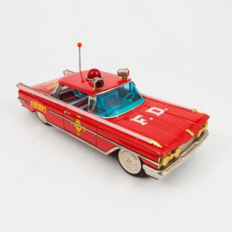 A tinplate Ichiko "Fire Dept Chief's car" Oldsmobile, Japan, 1960s.