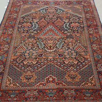 SEMI-ANTIQUE KASHAN. 224 x 134,5 cm.