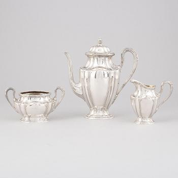 A three piece rococo style silver coffee service by John Victorin, Varberg, 1920.