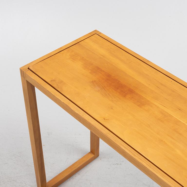 A pair of contemporary side tables from Karl Adnersson och söner.