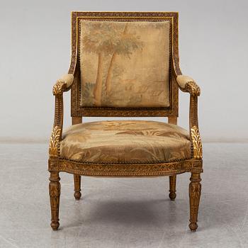 A late 19th century Louis XVI-style armchair.