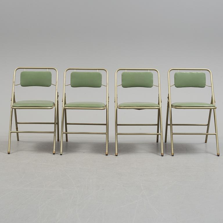 A table and four chairs by Dipetrol, second half of the 20th century.