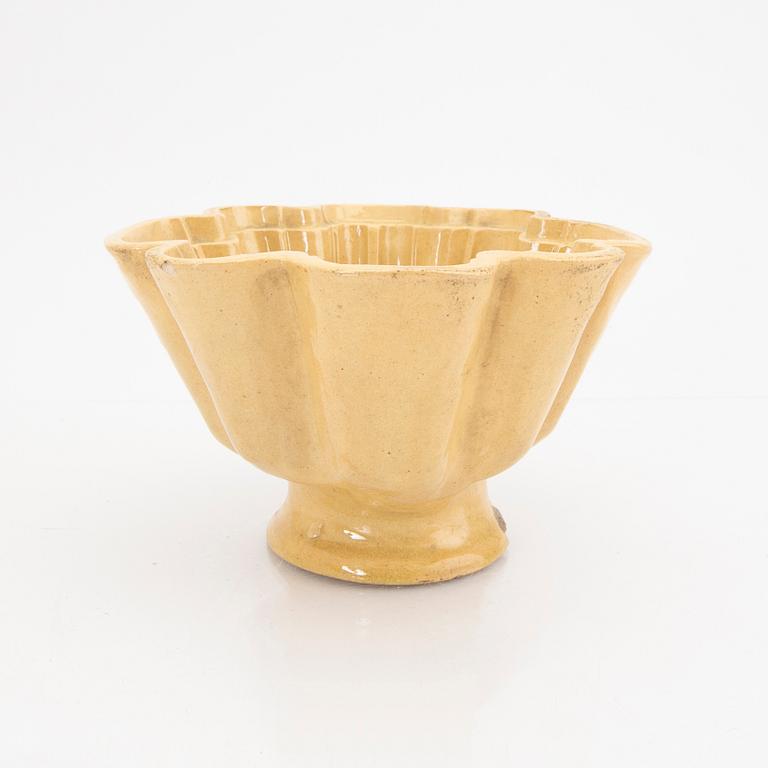 A set of five glazed earthenware moulds from Höganäs around 1900.