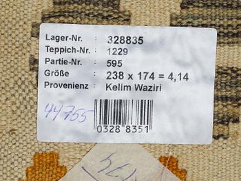 A carpet, kilim, ca 238 x 174 cm.