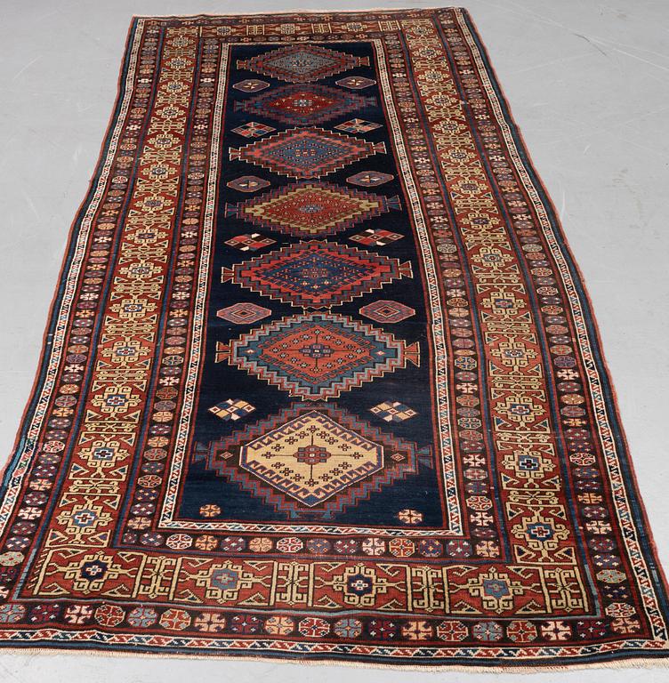 A runner antique Shirvan, probably, around 370 x 140 cm.