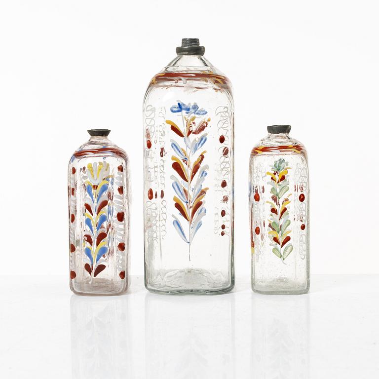 Three glass bottles, possibly Germany, 19th century.