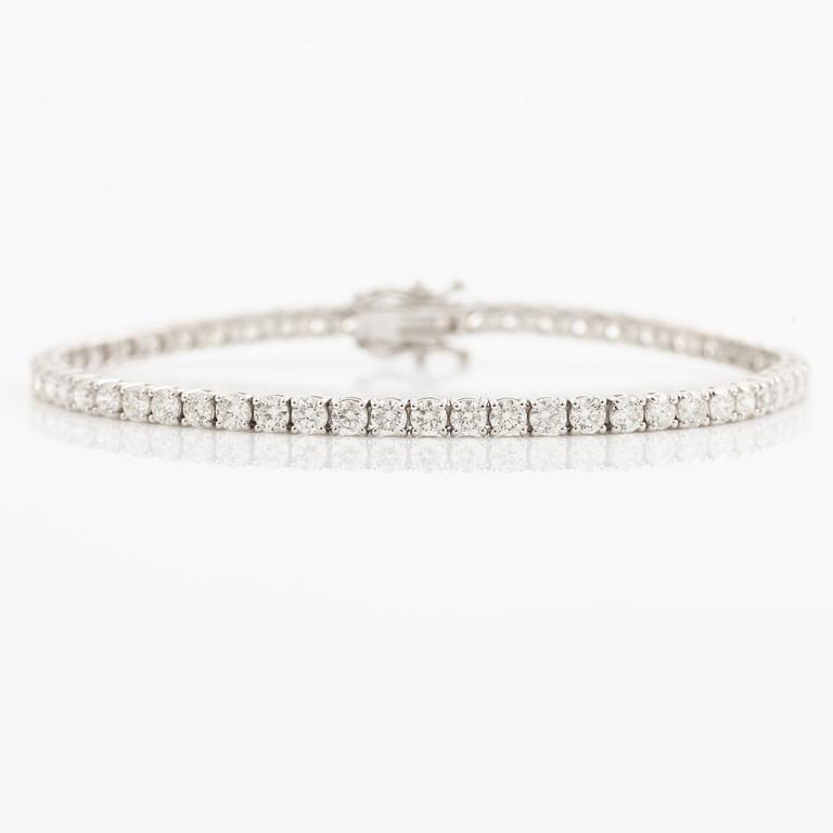 Tennis bracelet 18K white gold with brilliant-cut diamonds.