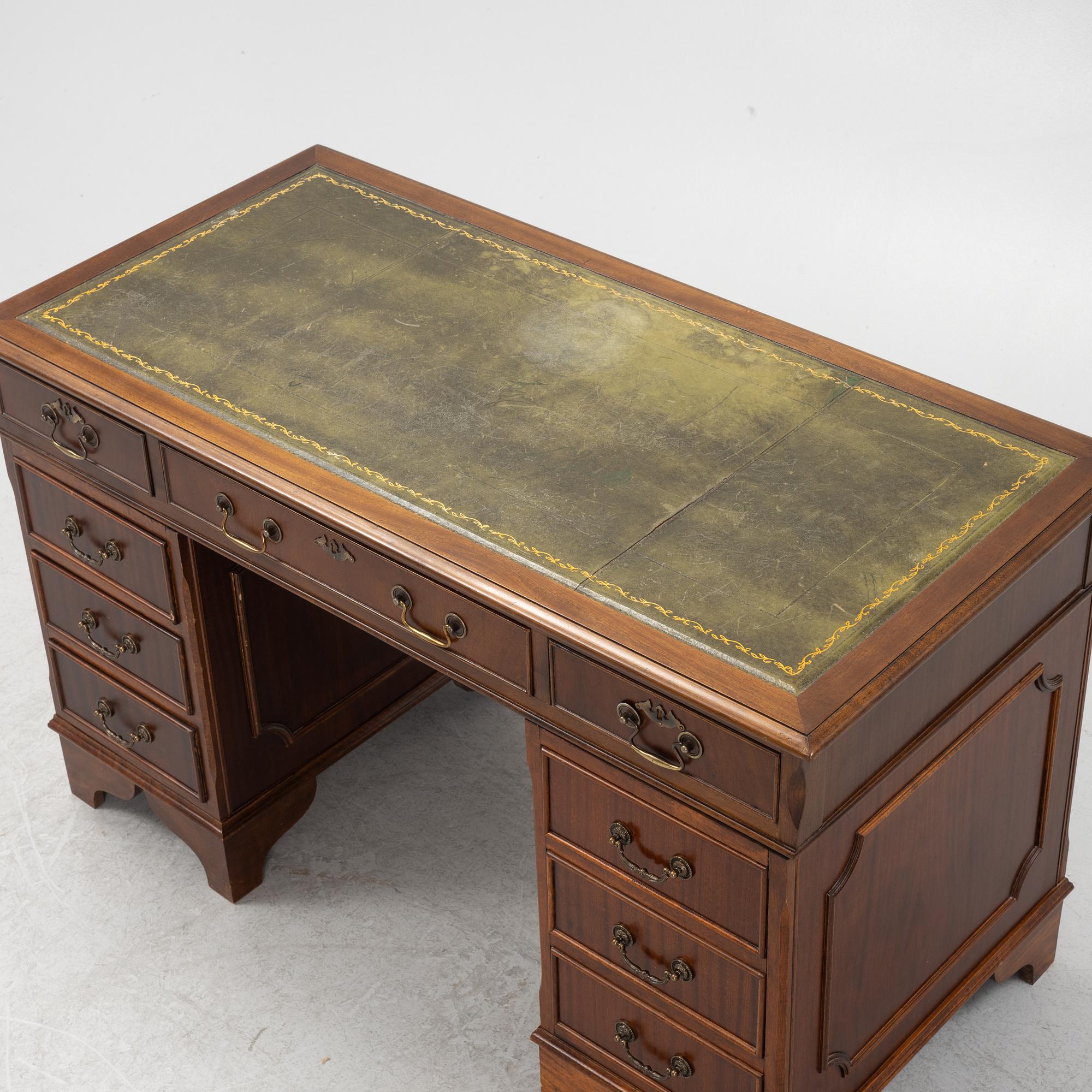 An English style mahogany desk, second half of the 20th Century.