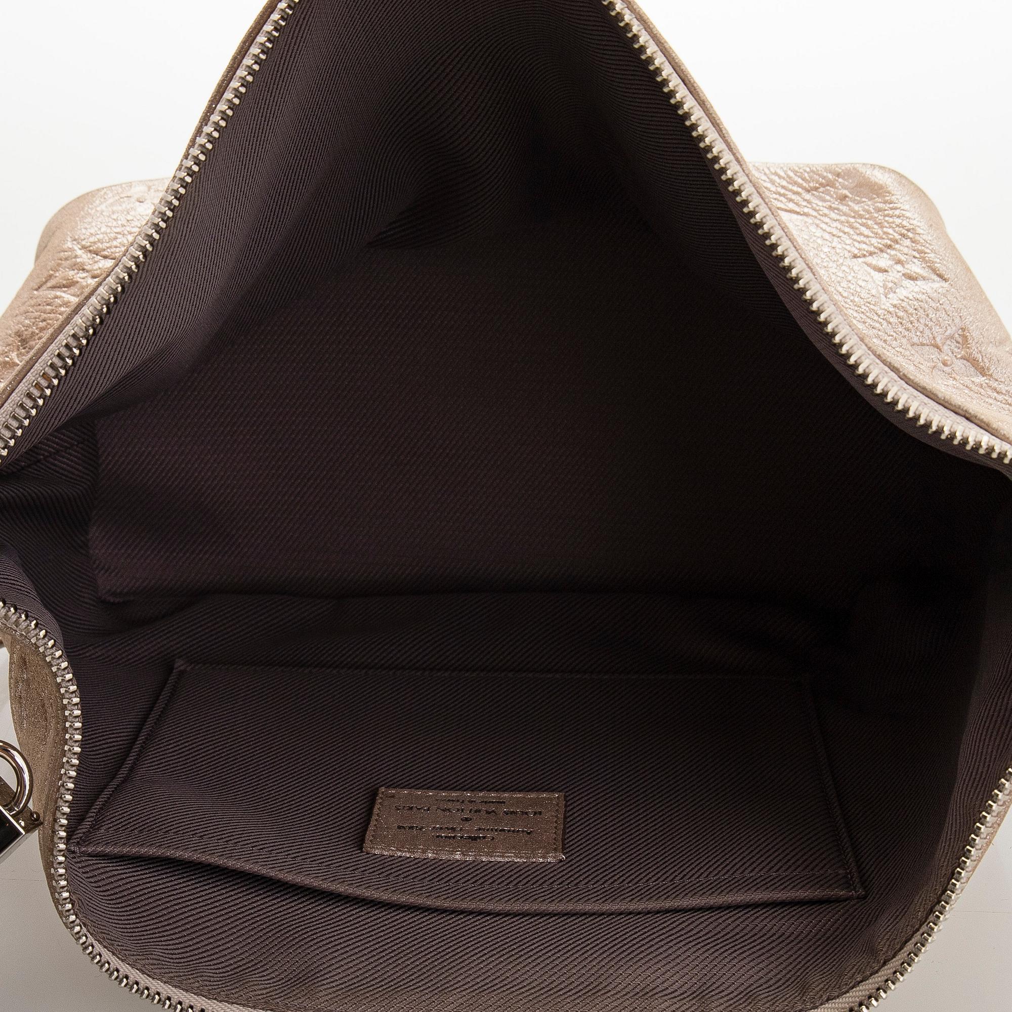 Louis Vuitton, a shimmer 'Halo' bag.