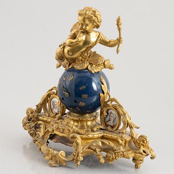 A Louis XVI-style mantle clock, late 19th century.