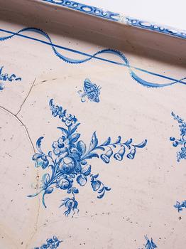 A blue and white faience tea table, second part of the 18th century.