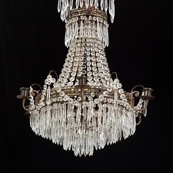 An Empire style chandelier, mid 20th century.