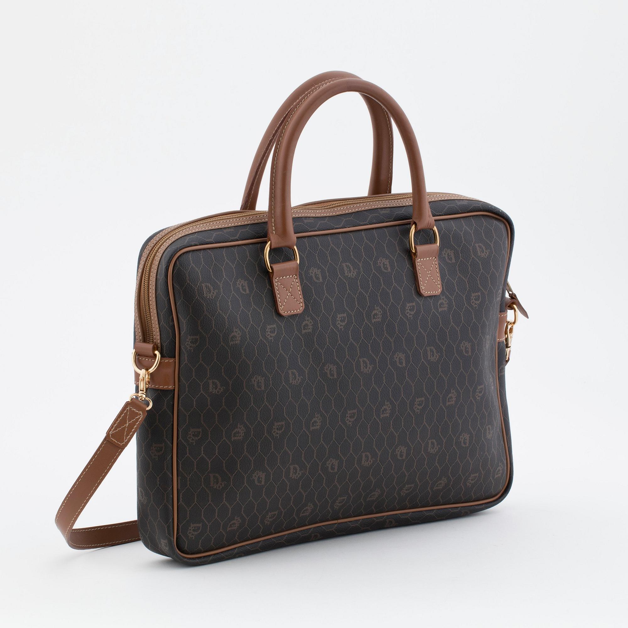 CHRISTIAN DIOR, a brown bag briefcase.