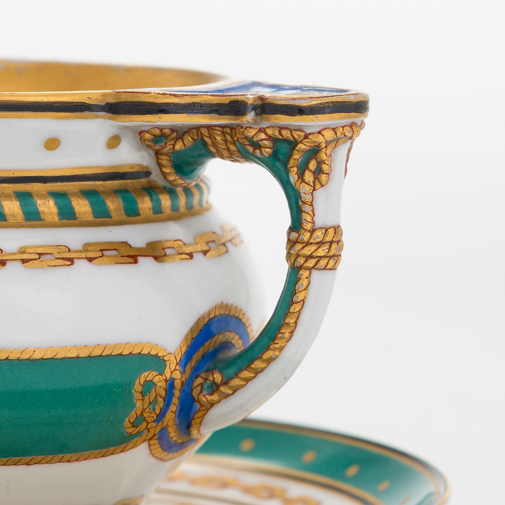 A cup and saucer from the Derzhava service, Imperial Porcelain Manufactory, St. Petersburg, late 19th century.