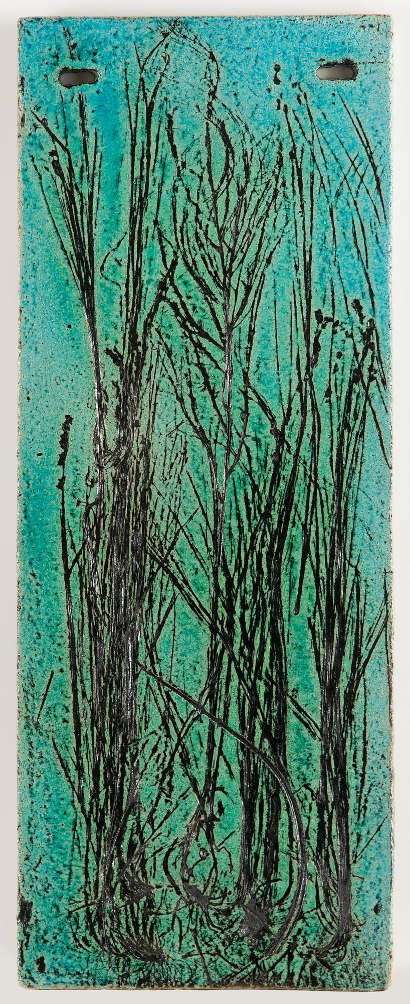 Toini Muona, a stoneware relief, signed TM.