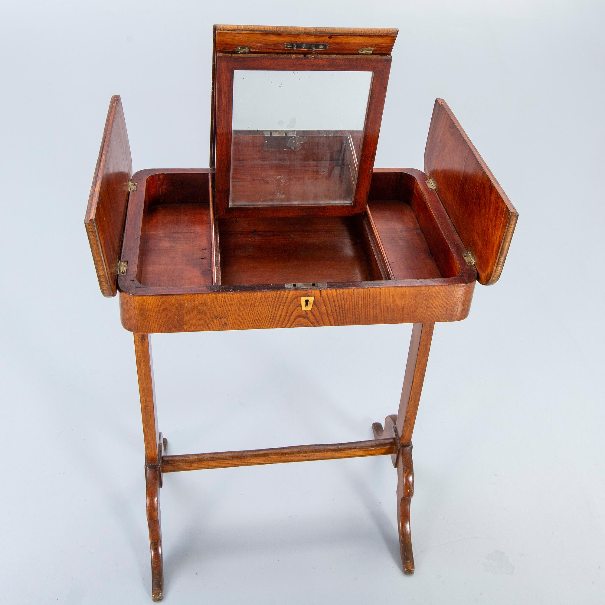 A mid 1800s dressign table.