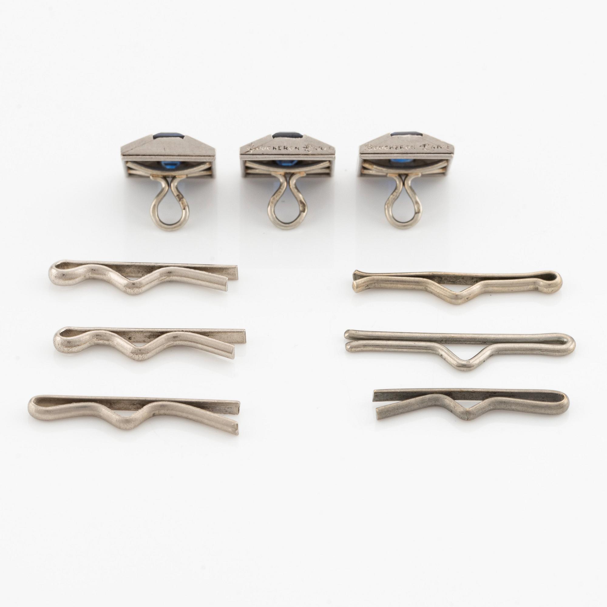 Three platinum Boucheron shirt buttons with step-cut sapphires.