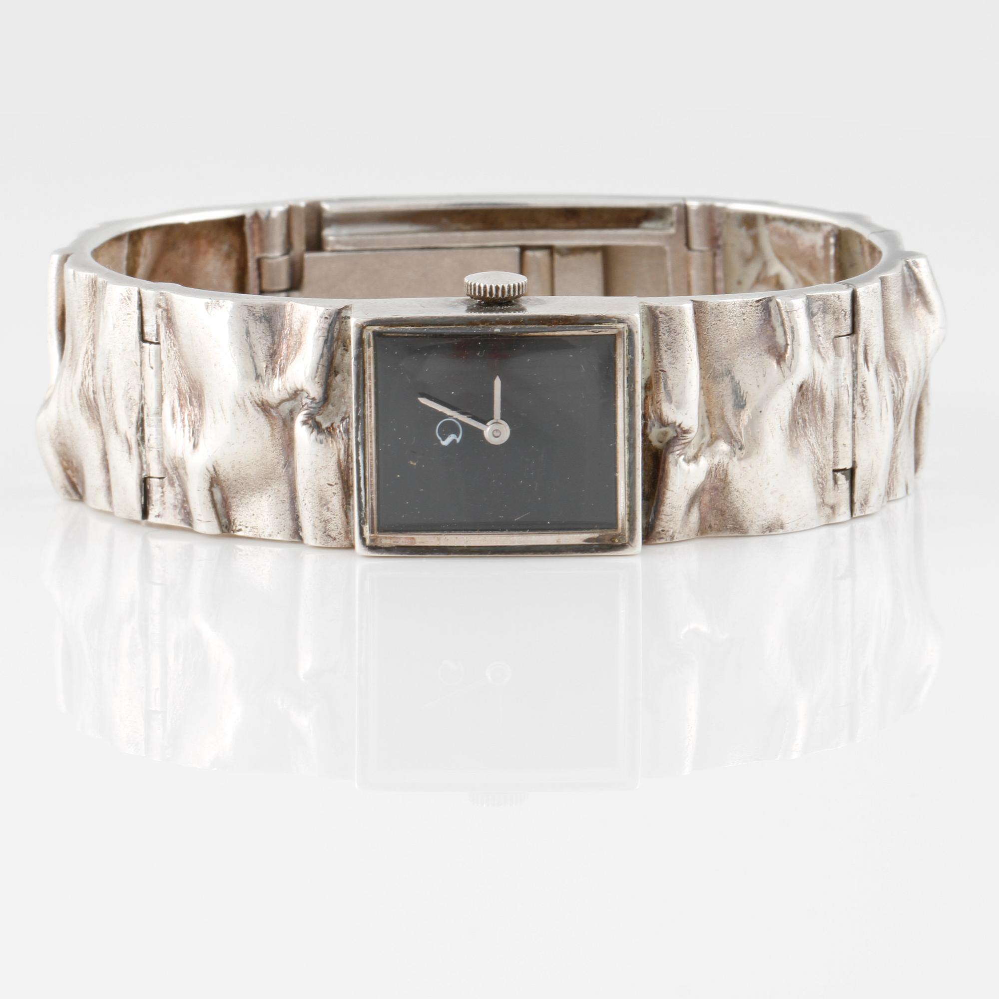 ARMBANDSUR, sterling silver, Matti Hyvärinen, Sirokoru, Åbo, 1975. Total vikt 55 g.