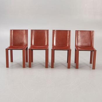 A set of four Matteo Grassi leather chairs alter part of the 20th century.