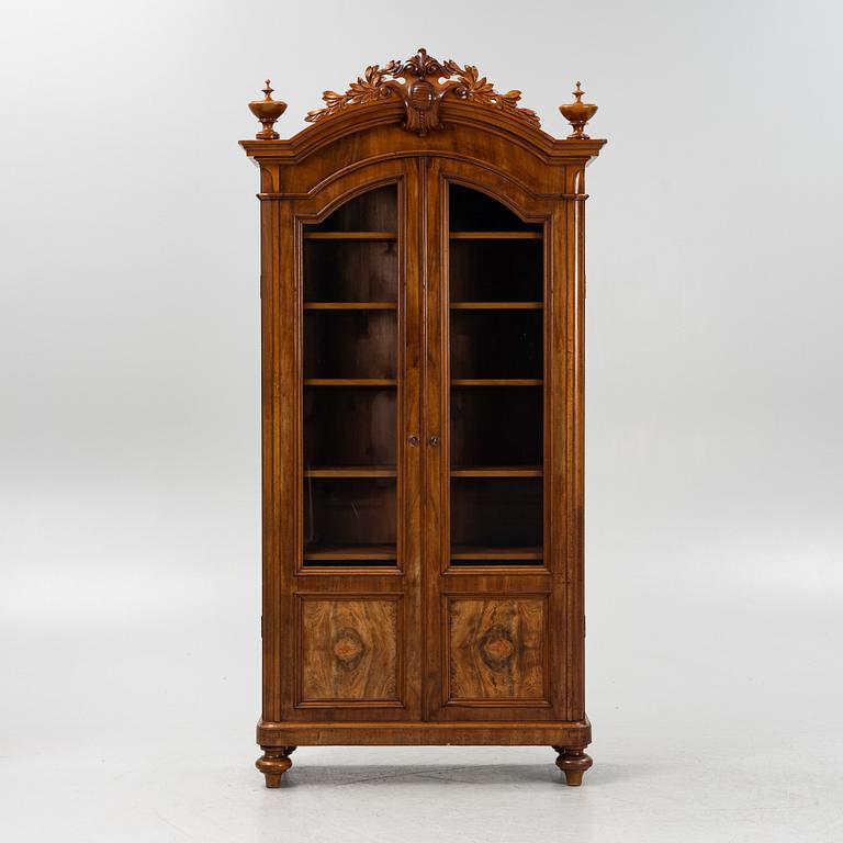 A mahogany veneered book cabinet ,second part of the 19th Century.