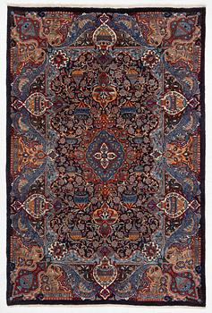 A Kashmar carpet, c. 295 x 198 cm.