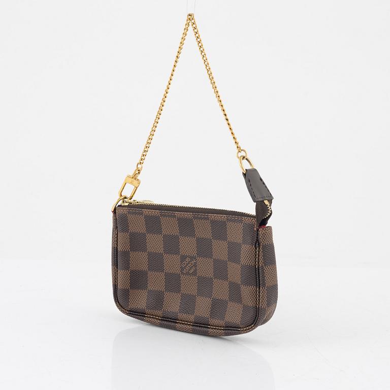 Louis Vuitton, "Mini Pochette Accessoires", 2011.