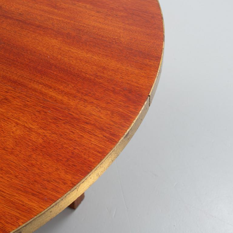 A mid 20th century dining table.