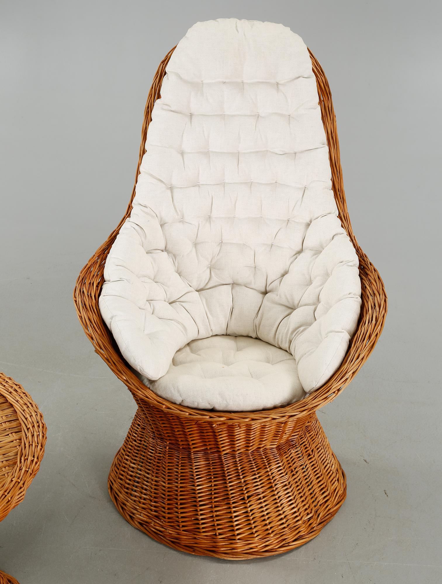 A pair of chairs and one table from the latter half of the 20th century.
