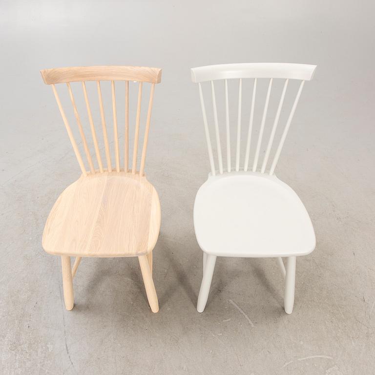 A set of two Carl Malmsten "Lilla Åland" chairs from Stolab, contemporary.