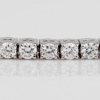 A brilliant-cut diamond line bracelet. Total carat weight of diamonds circa 2.70cts.