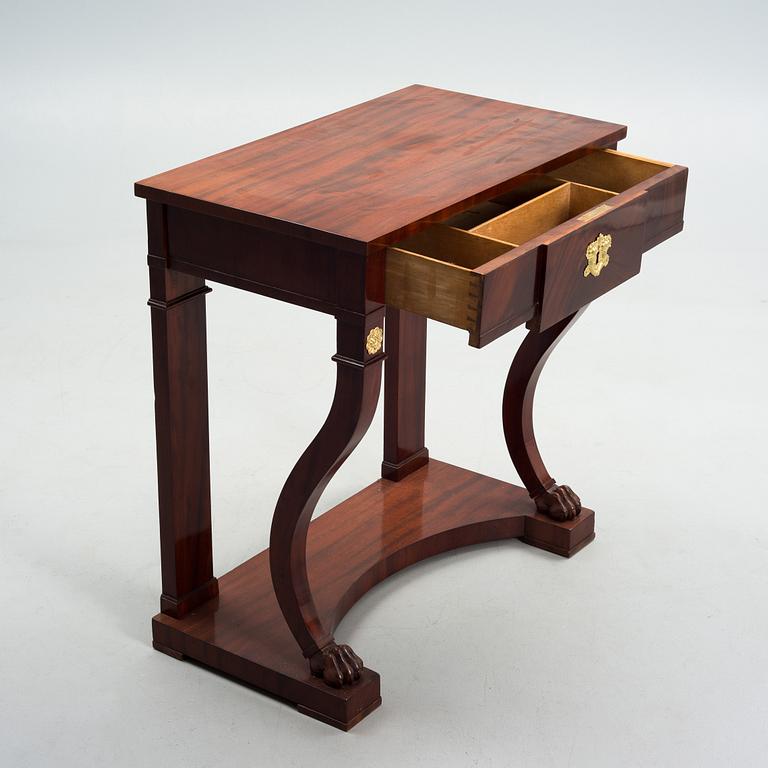 A CONSOLE TABLE, empire, early 19th century.