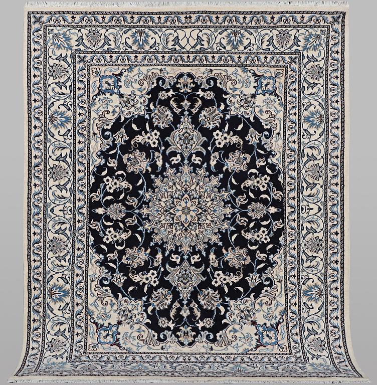 A rug, Nain, part silk, ca 198 x 144 cm.