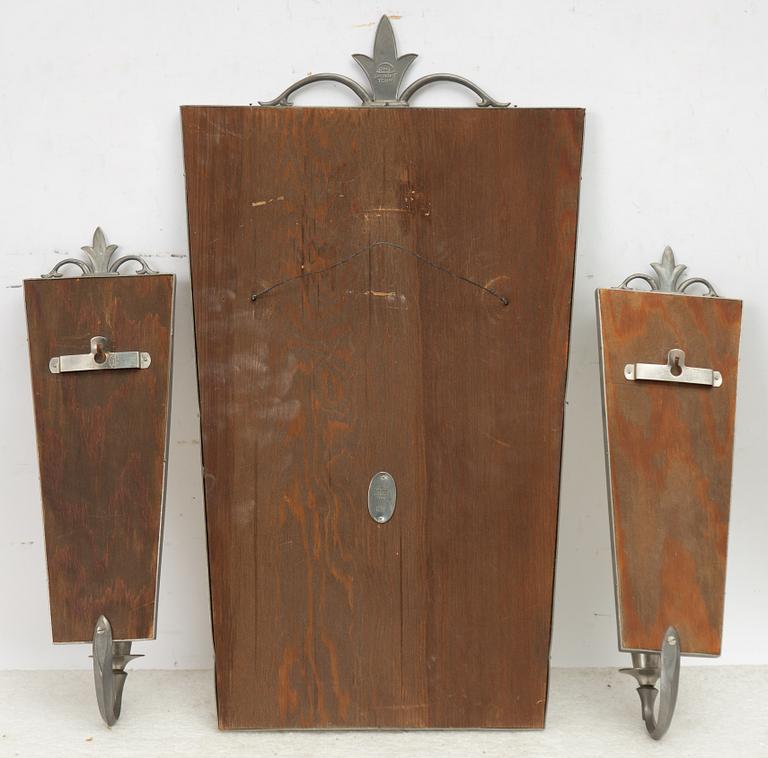 A mirror and pair of wall sconces, Sweden, 1932.