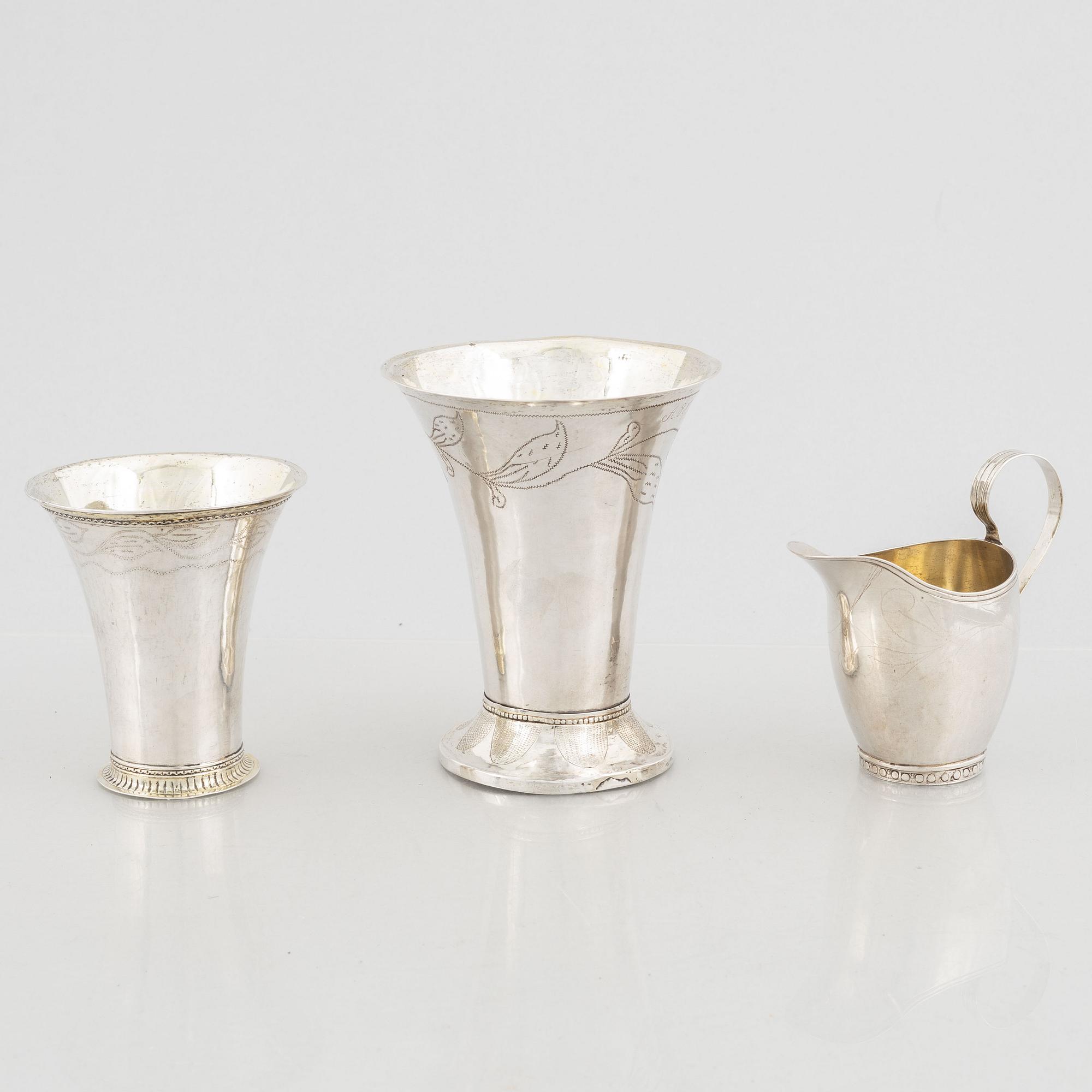 Two silver beakers and a silver creamer, 19th century, Finland.