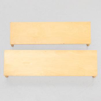 Alvar Aalto, a pair wall shelves, model 112B, Artek, Finland, late 20th century.