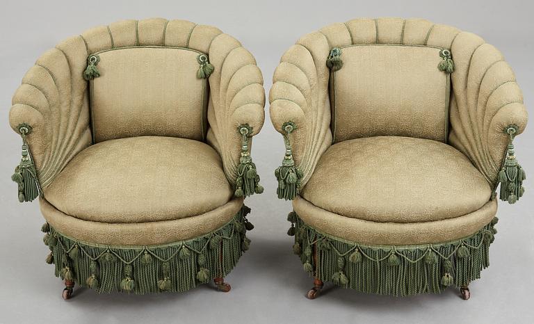 A pair of easy chairs, circa 1900.