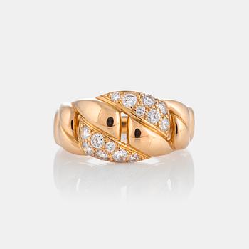 980. A Cartier ring in 18K gold set with round brilliant-cut diamonds.