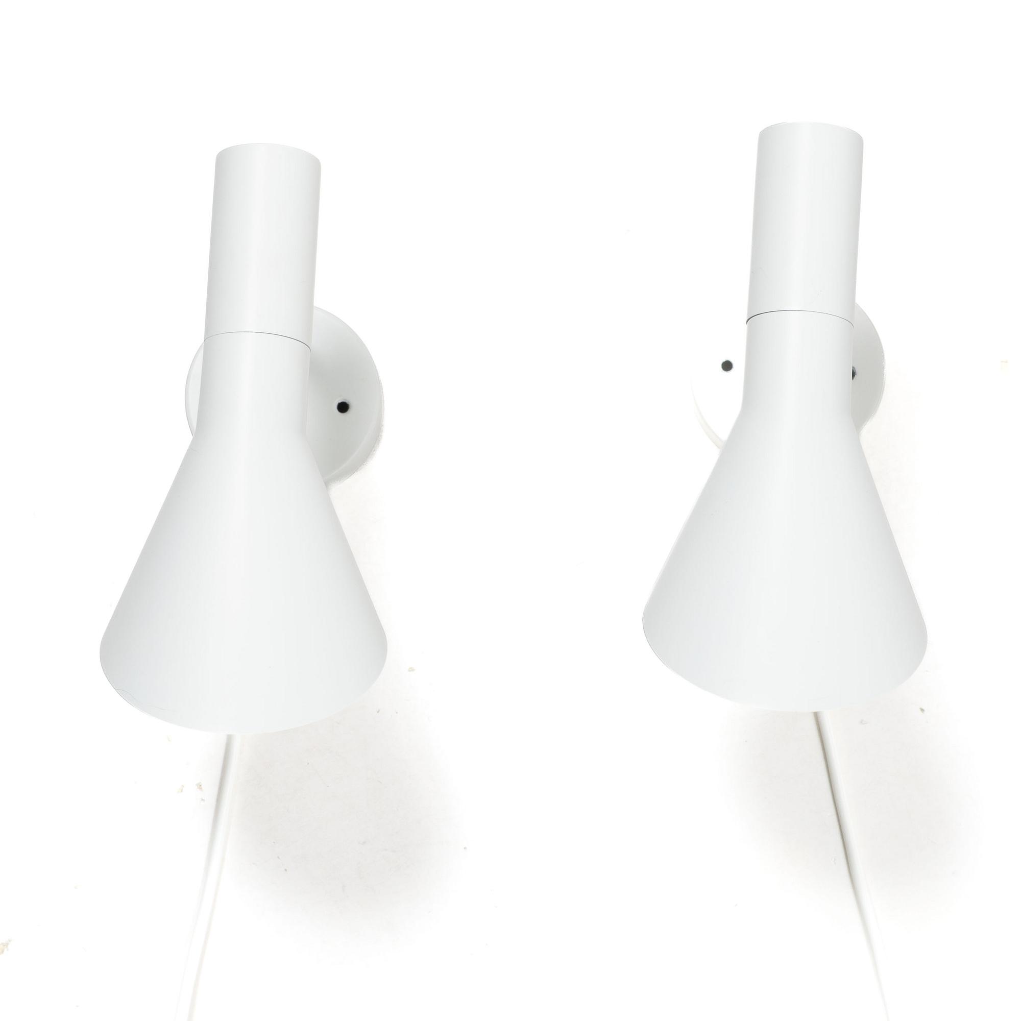 Arne Jacobsen, Wall lights/bedside lights, a pair, “AJ”, Louis Poulsen, Denmark.