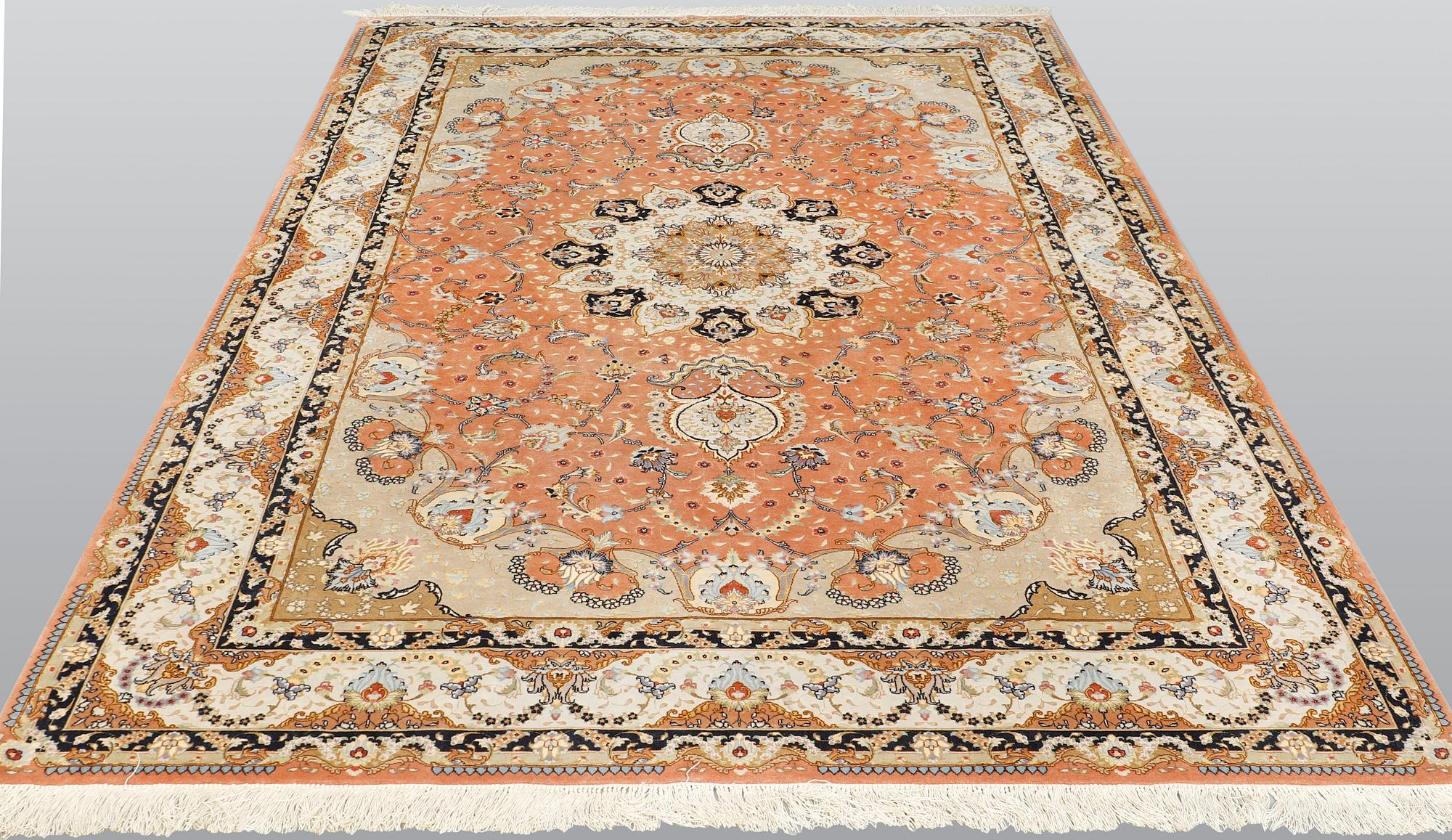 A part silk Tabriz carpet, so called 50 Raj, c 301 x 200 cm.