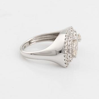 Ring with marquise and brilliant cut diamonds.