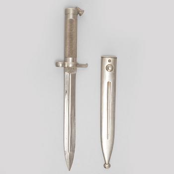 A hunting sword and two bayonets with scabbards.