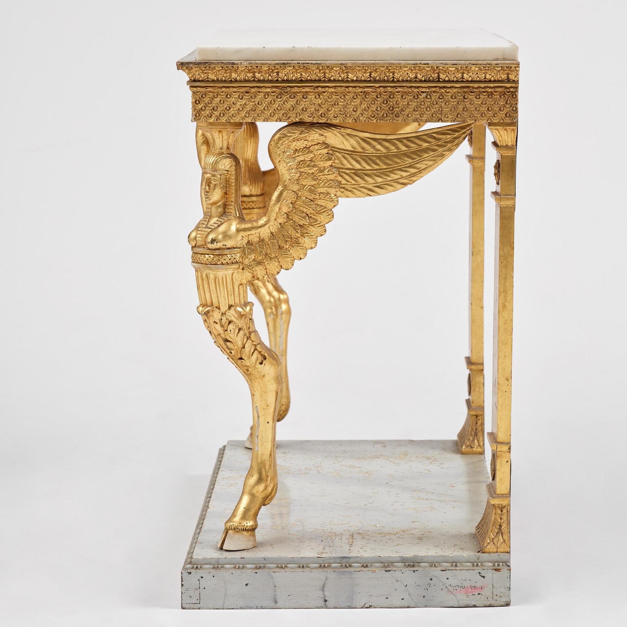 A late Gustavian giltwood console in the manner of J. Frisk, Stockholm, early 19th century.