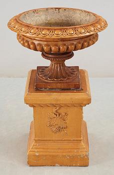 A Scottisch late 19th century yellow glazed stoneware garden urn and base by J&M Craig.