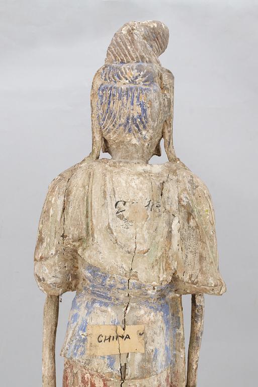 A wooden sculpture of Guanyin, Ming dynasty (1368-1644).