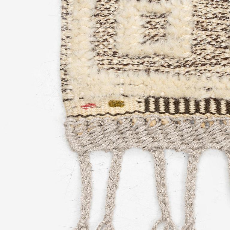 Märta Måås-Fjetterström, a 'Vita spetsporten' carpet, knotted pile in relief, c. 225 x 136 cm. signed AB MMF.