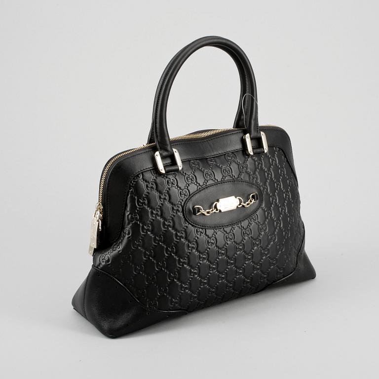 HANDVÄSKA. Gucci.