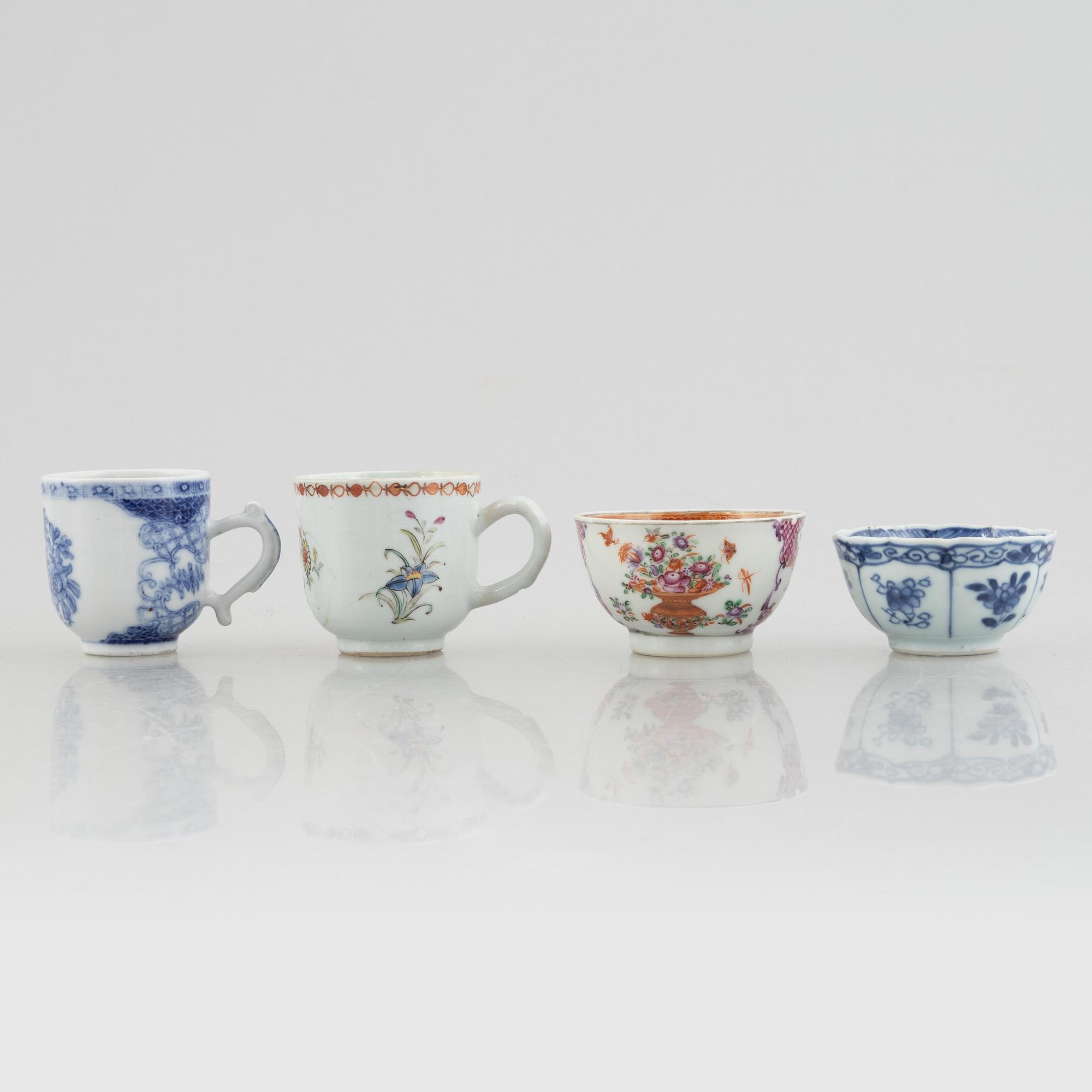 A creamer, seven porcelain cups and seven saucers, China, Qing dynasty, 18th century.