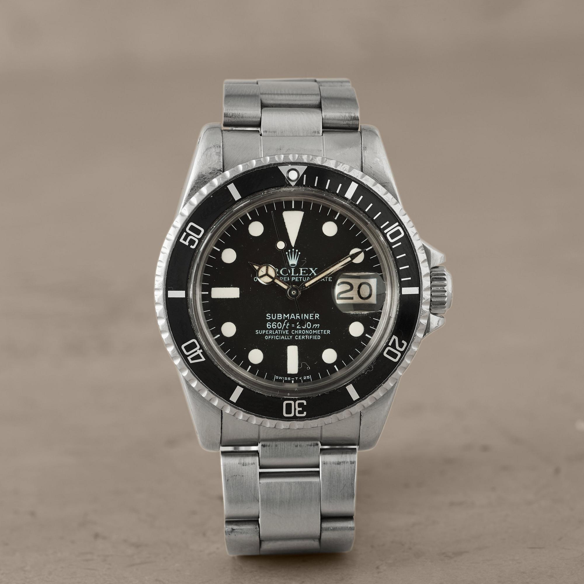 ROLEX Oyster Perpetual Date Submariner 660ft 200m SWISS T 25 White Mark I Chronometer armbandsur 40 mm Bukowskis